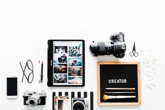 tablet and cameras on a table