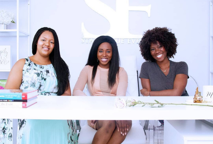 three women sitting behind a panel learning about work life balance