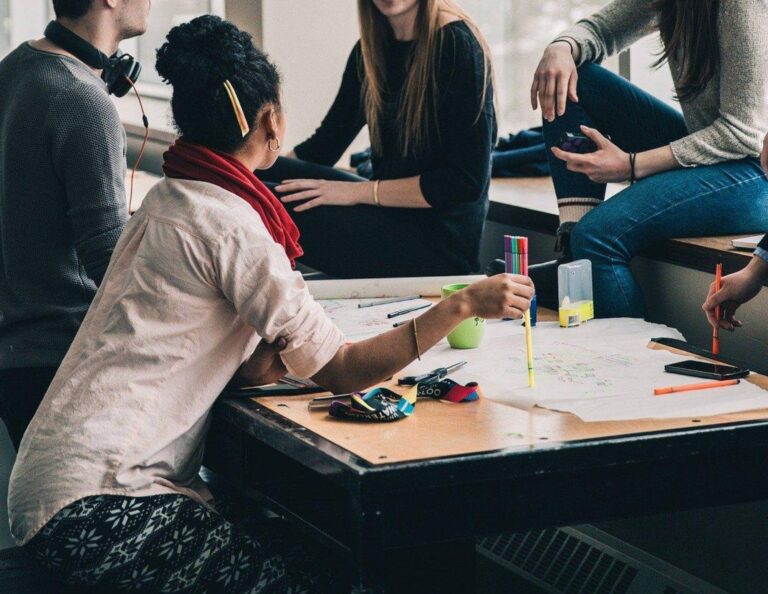 Group of people sitting down for an in-person meetings