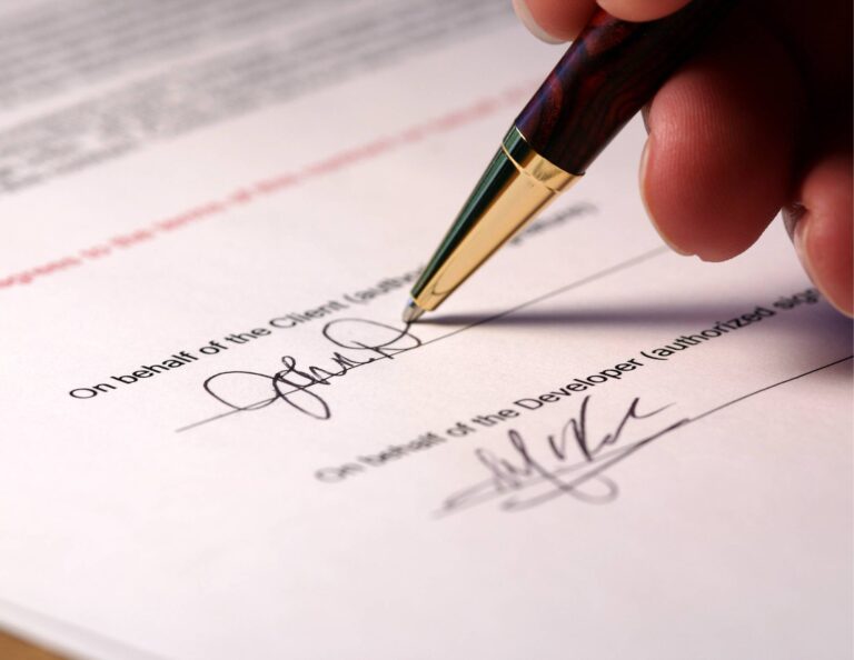 Person signing a contract